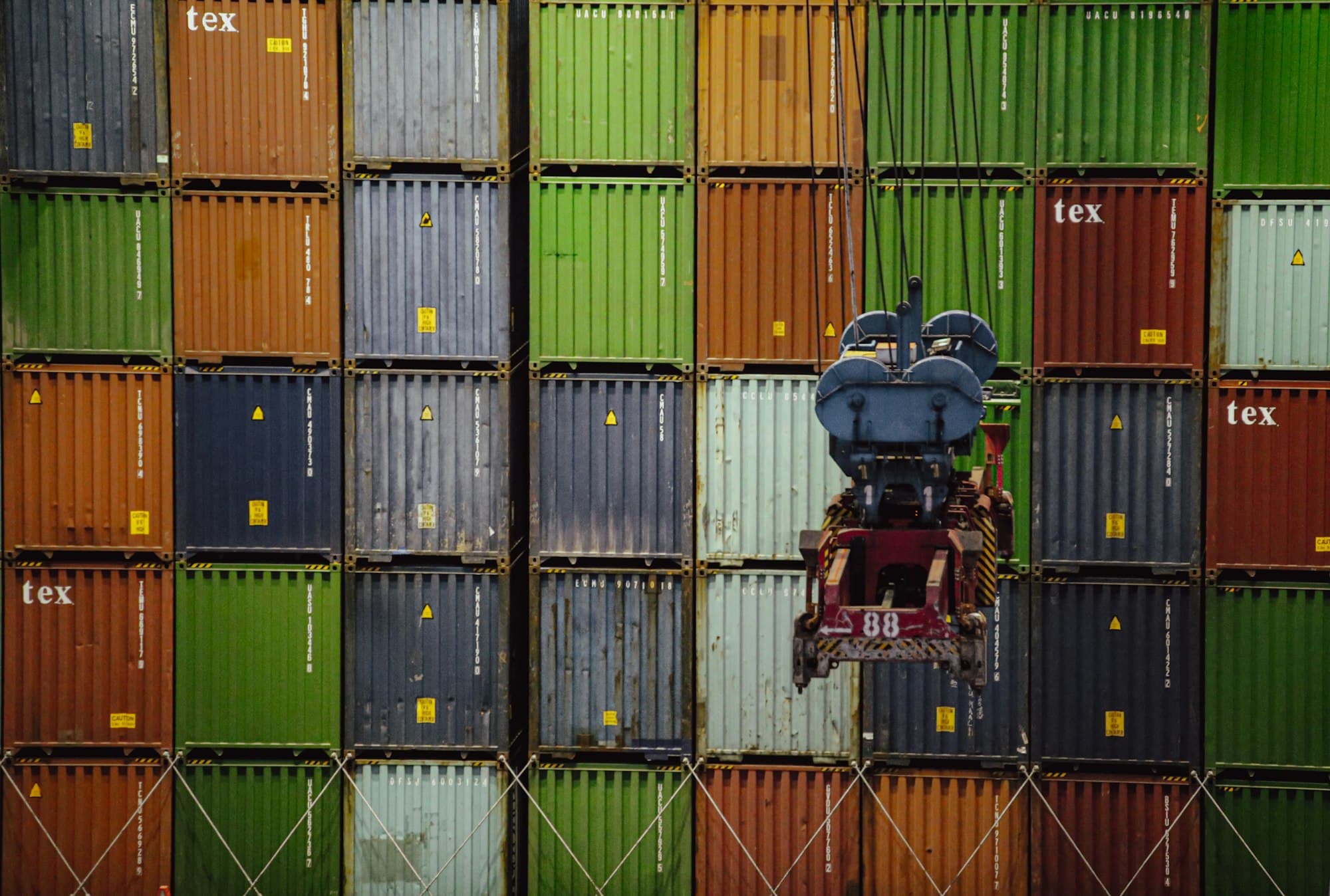 Stacked shipping containers at a port terminal